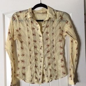 Small woman’s floral blouse